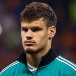 Liverpool Defender Milos Kerkez Criticized by Gary Neville After Chelsea Loss 3 GettyImages 2238243572